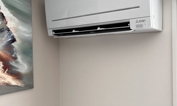 Installation d'une climatisation Mitsubishi dans un appartement à La Buisse